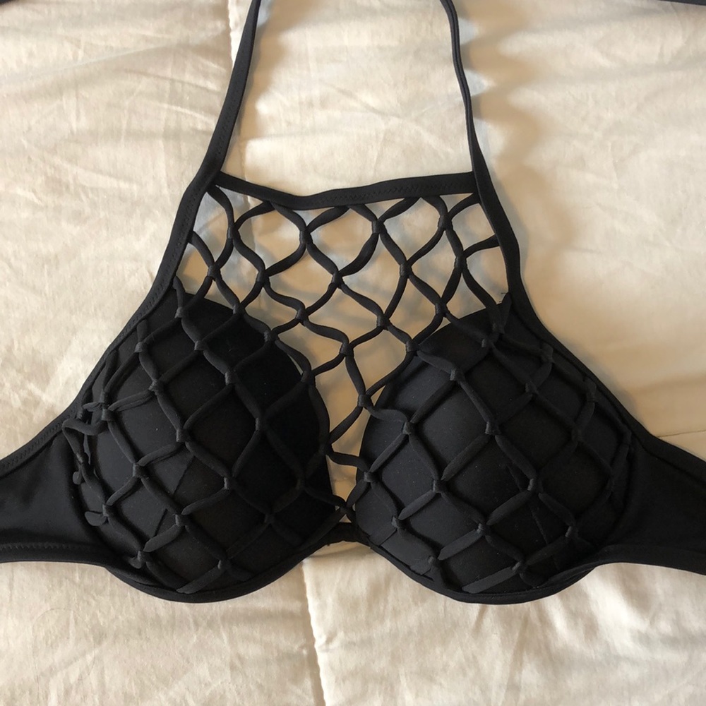 Super cute and fun bikini top! Only worn once!